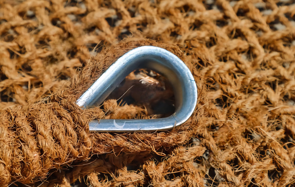 Détail œillets galvanisés voile d'ombrage 3x4m fibre de coco anti-corrosion

